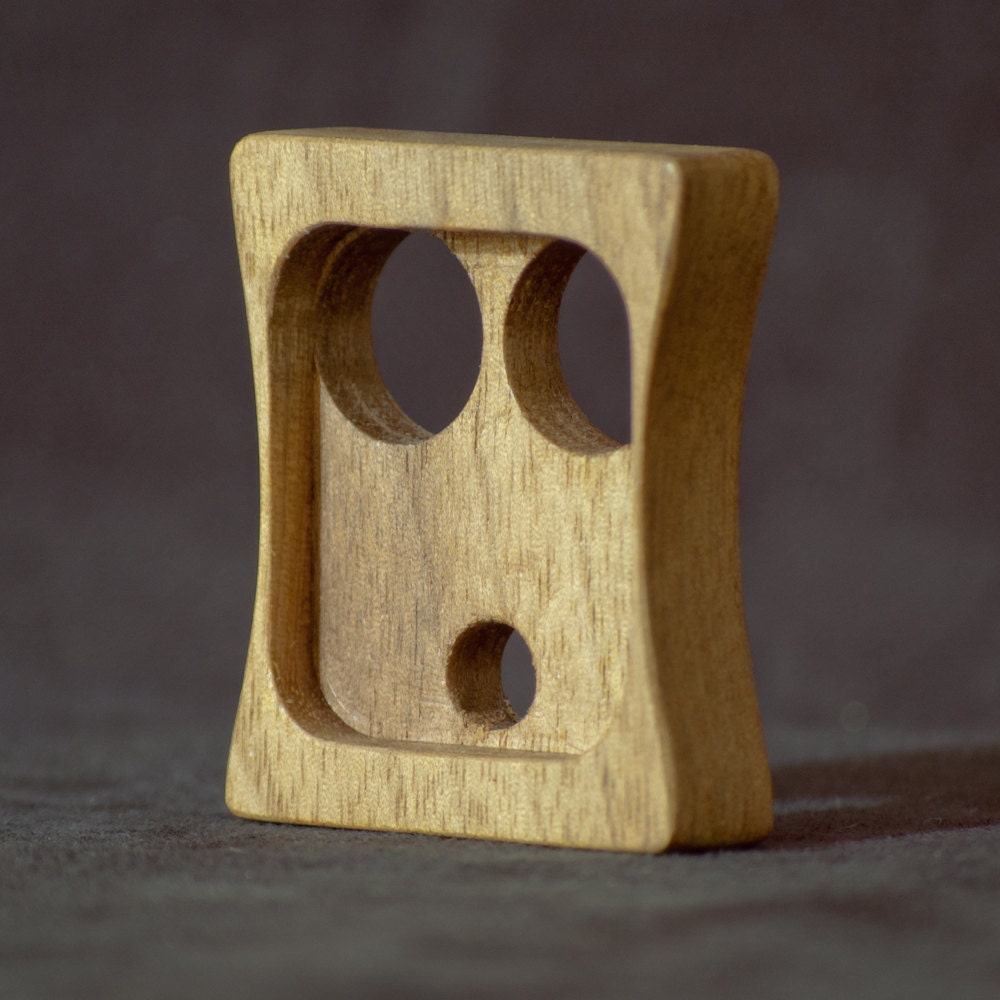Walnut "Oh Face" Earbud Holder
