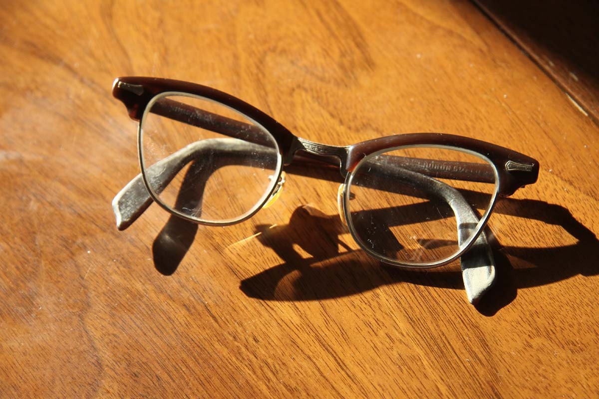 1950s or 60s brown cat eyed granny glasses.