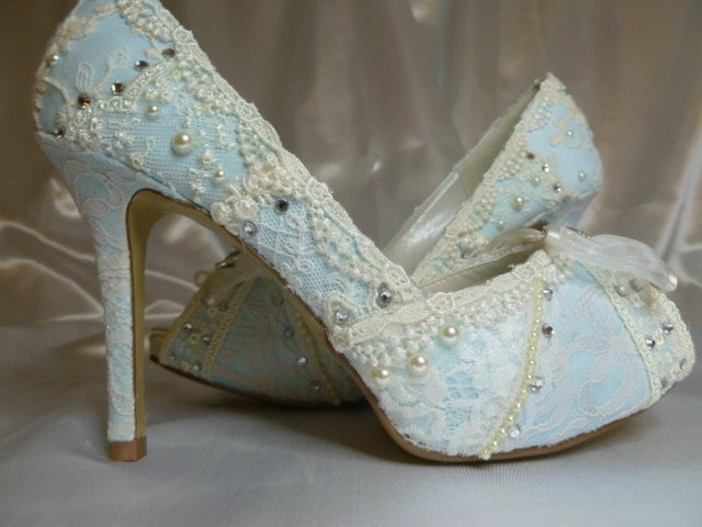 Something Blue ...baby blue lacey wedding shoes..you choose the style and height.