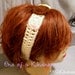 White Crochet Acrylic Headband with Pink, Brown, & Yellow Circle Appliques, ties for fit