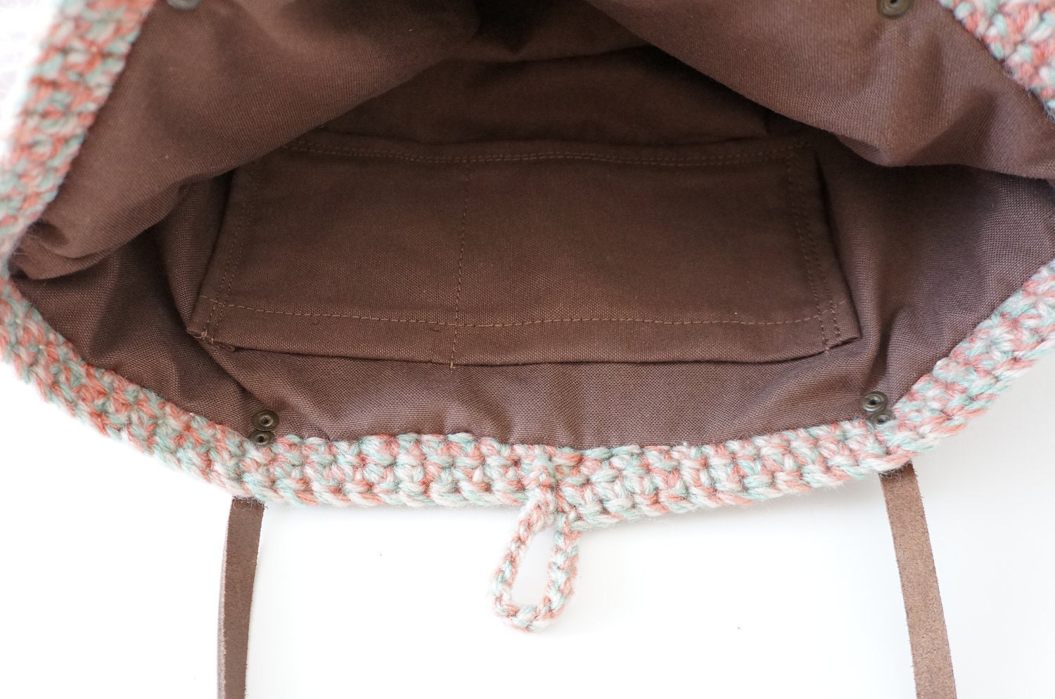 Hand knitted tricolor basket bag with genuine leather straps