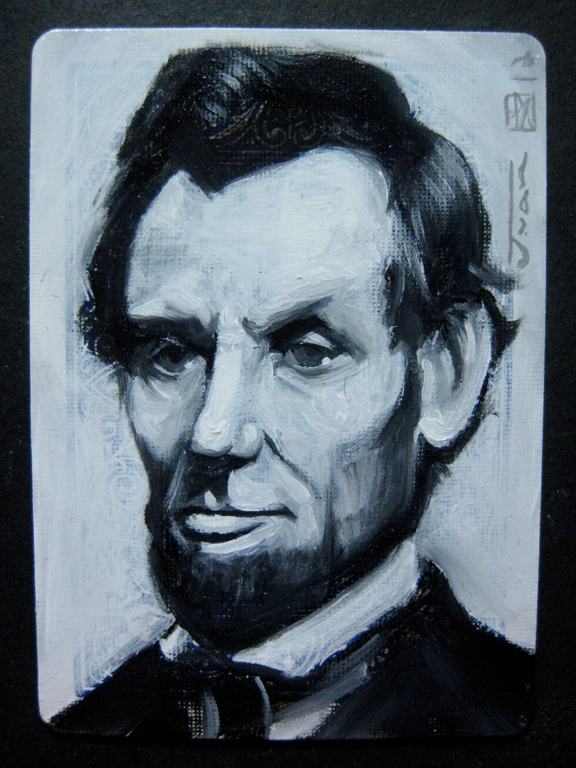 Portrait of Abraham Lincoln. Oil painting on a playing cards 2012