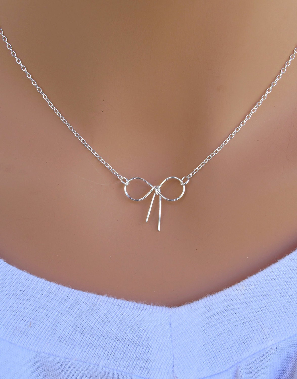 Tiny bow tie knot sterling silver necklace. Bridal. Wedding. Bridesmaids Gift. Everyday Wear.