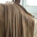 Fringed  Tassel Handbag with Boho Chic Style. Vintage chain detail.