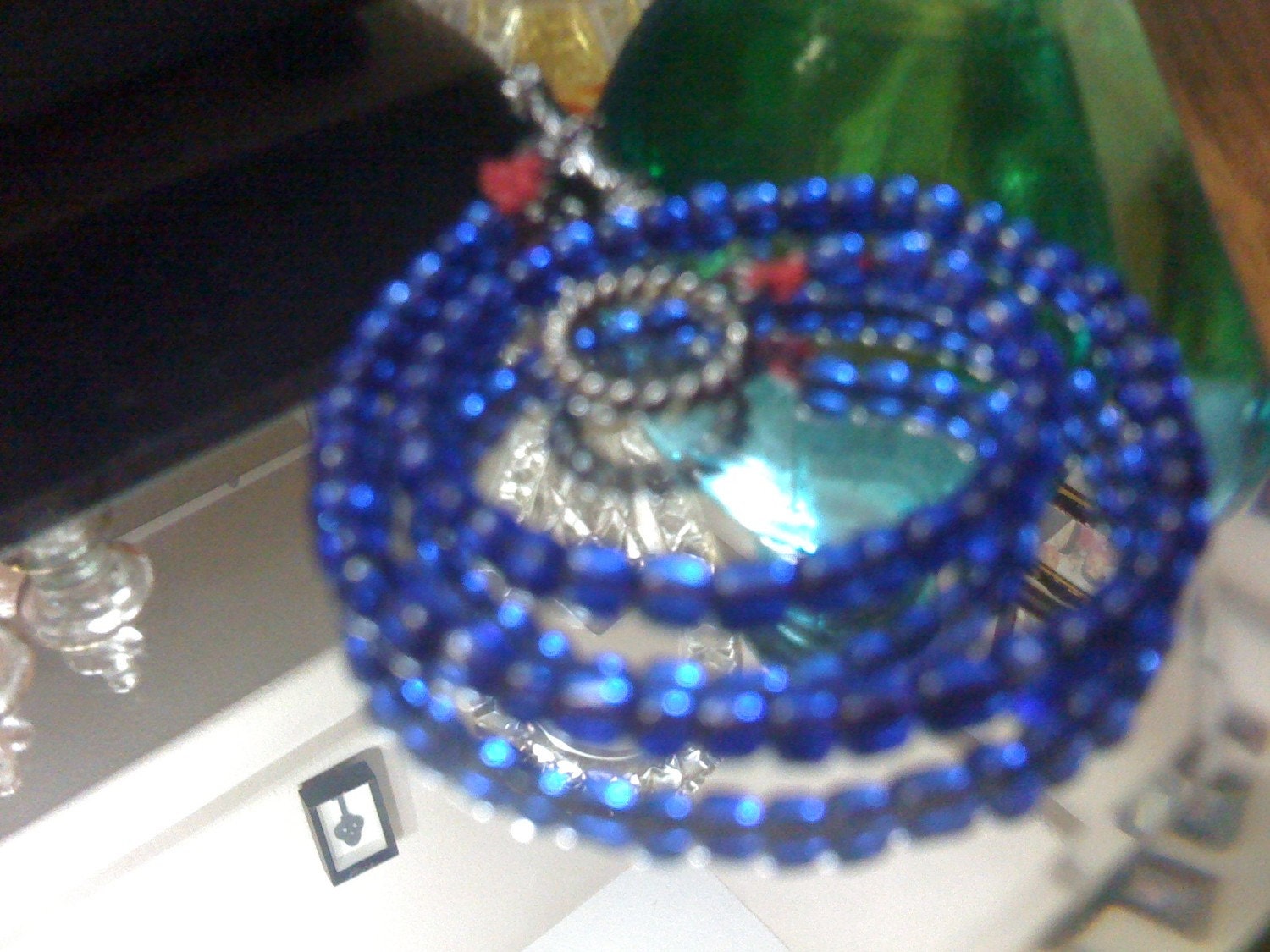 Blue bead anklet to avert the evil eye