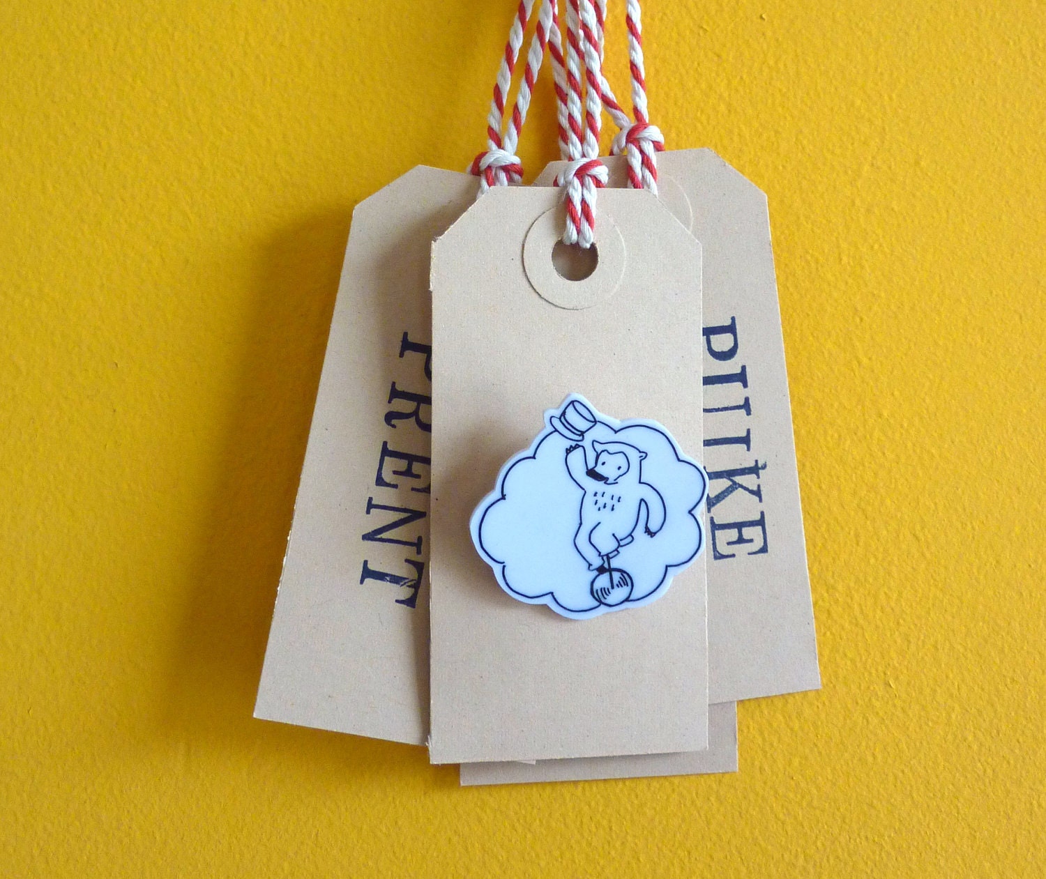 Cycling Bear Brooch - original drawing on shrink plastic