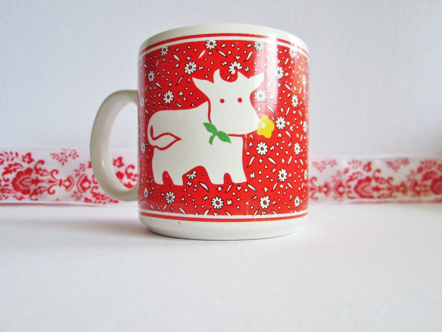 Cute Retro Mug Of Cow Holding Yellow Flower in Her Mouth