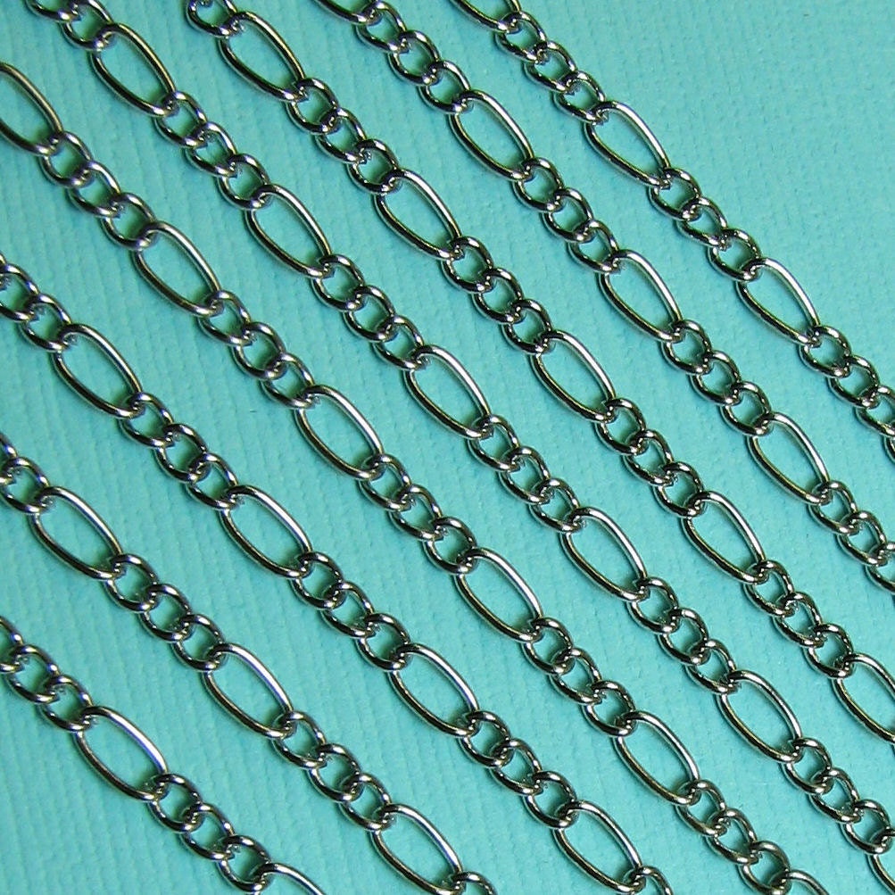 Open Link Curb Chain, Silver Figaro - 26 feet ... Silver tone Open Link Curb Chain, Figaro 2.5mm (3/1) ... Lead free / Nickel free B02932.3