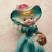 Vintage Girl with Basket Figurine