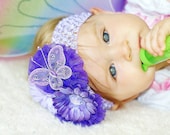 baby hair bow...hairbow..Pretty purple flower clip with butterfly great hair bow  for newborn, infant, and little girls...baby bow