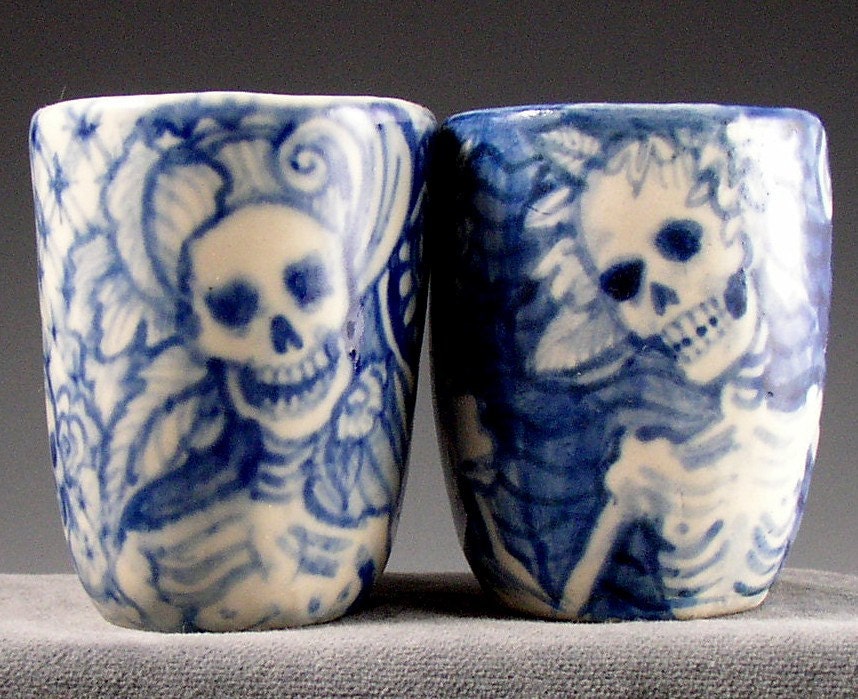 porcelain cup pair with skeletons