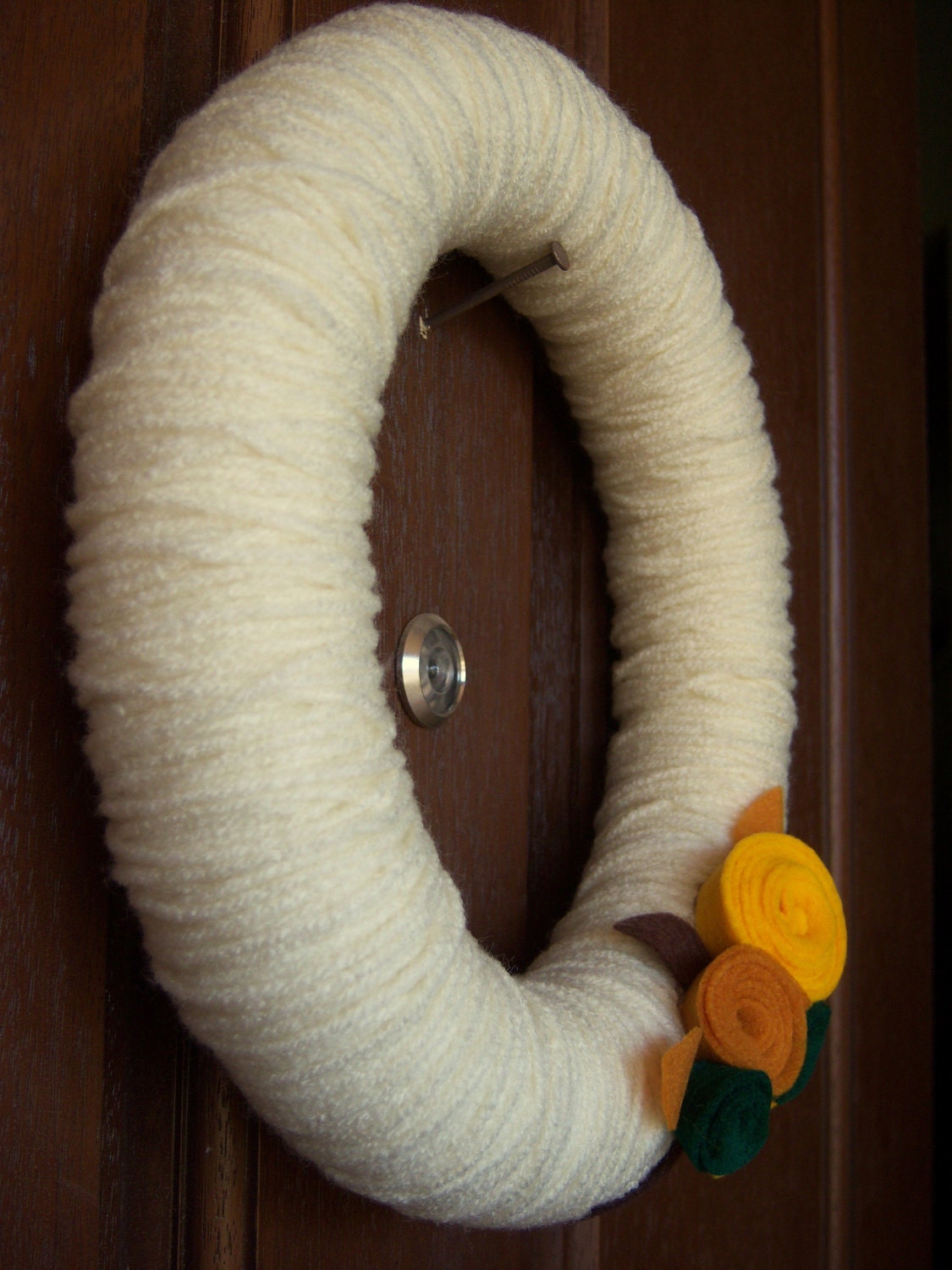 Yarn Wreath with Felt Flowers in Autumn Colors