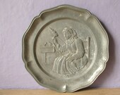 vintage decorative plate, 1950's pewter plate, primitive decor, victorian woman knitting, country farm kitchen decor