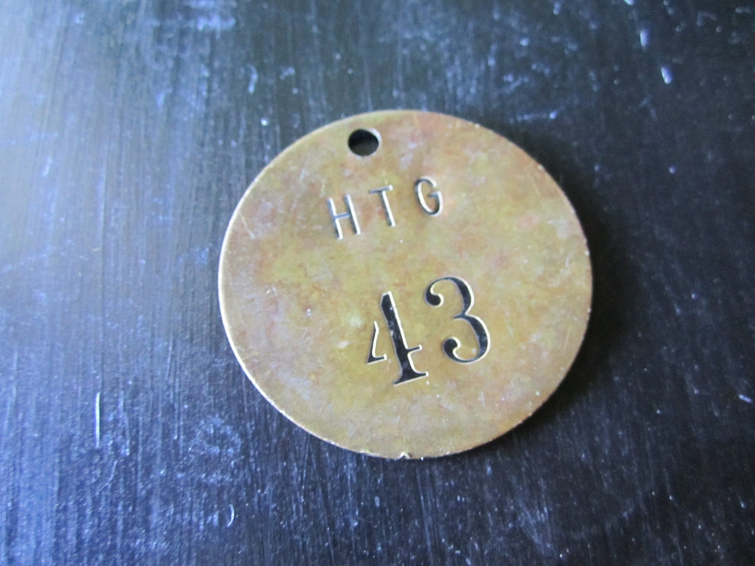 Brass tag Number Forty Three