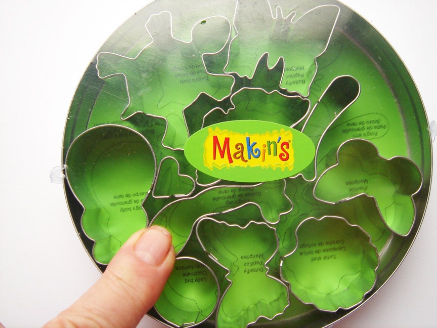 Brand New Set of Bugs, frog, and turtle cutters in a tin HC151