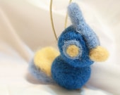 wide-eyed blue and yellow needle felted bird ornament