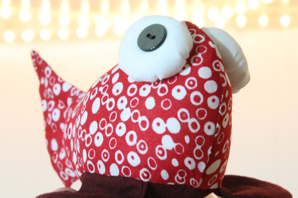 beady-eyed fish in red and white cotton print