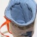 bleached navy and orange drawstring pouch