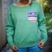 green tribal pocket sweatshirt