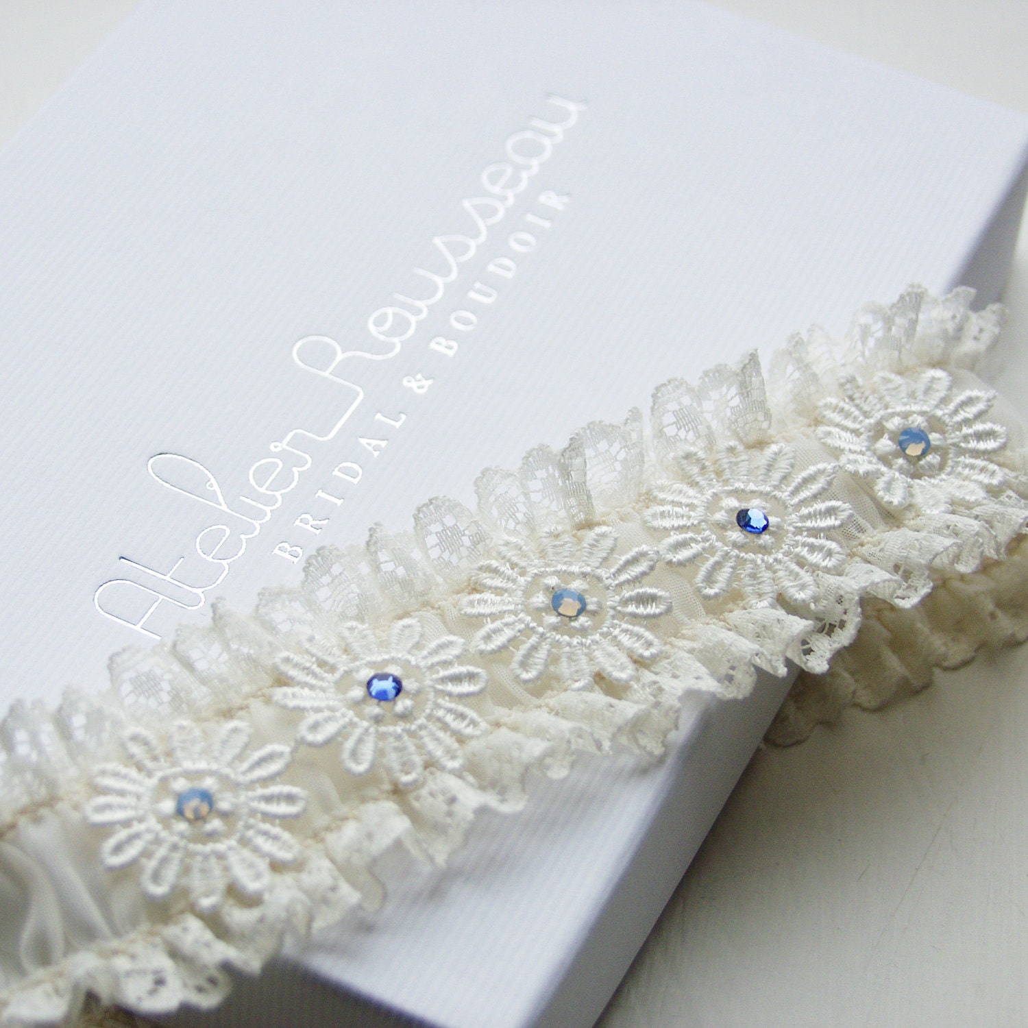 Couture Bridal Garter - Ivory Lace Garter with Venice Lace Applique and Blue Swarovski Crystals
