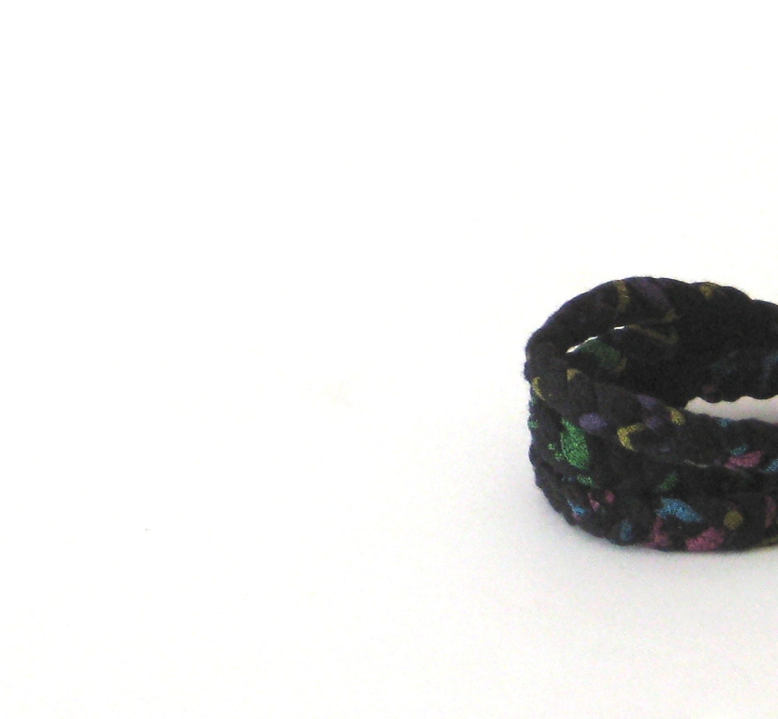 Braided Fabric Bracelet in black with multi colored neon design.