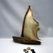 driftwood sailboat with parchment