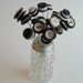 button bouquet in vintage pepper shaker
