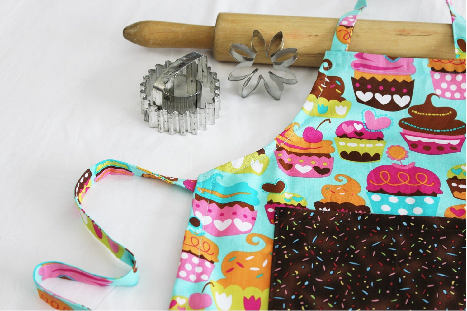 Sweet Cupcakes Child Apron - teal with chocolate sprinkles pocket