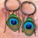 Bohemian Peacock Feather Hoop Earrings: Cotton Wrapped Hoops with Chain Accents