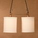 Burlap Lighting with Twin Light Burlap Cylinders and Antique Brass Spreader Bar and Black Twisted Wire