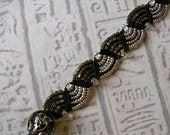 Micro macrame bracelet. Egyptian. Black matte metallic khaki and silver.