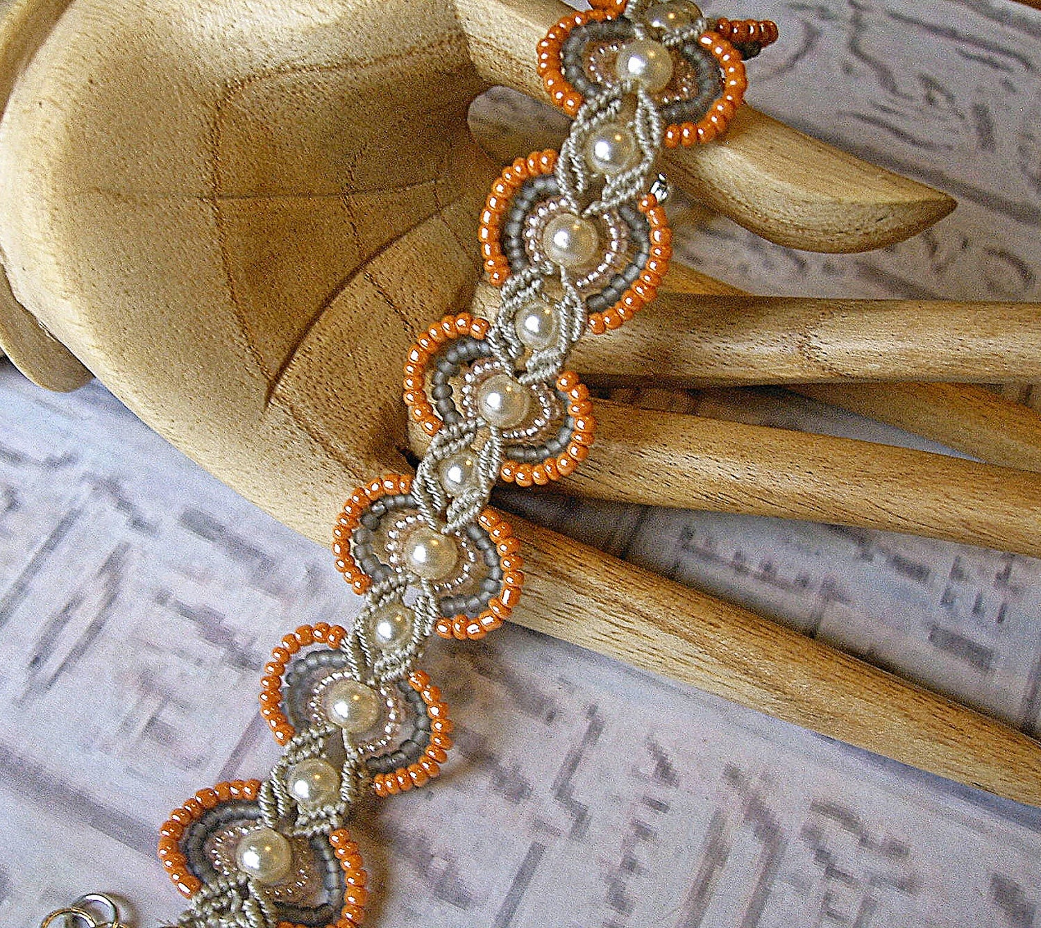 Handmade Micro macrame bracelet in peach, pearls and silver gray.