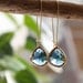 Blue Sapphire. Stunning 16k gold plated deep sea glass stone dangle earrings