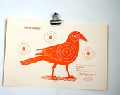 reproduction hunting targets: murder of three crows in red, orange, and black