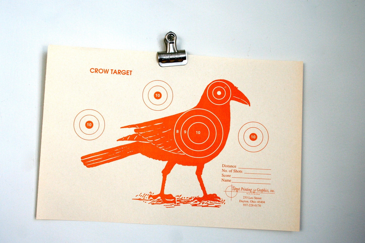 reproduction hunting targets: murder of three crows in red, orange, and black