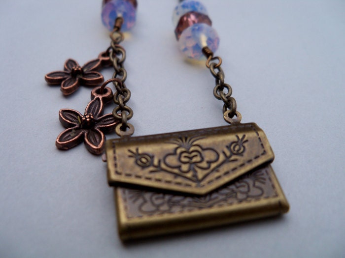 Assymetrical Envelope Locket Necklace, 19 inches long, Antiqed Bronze, Openable Envelop Locket, Flowers, Purple Crystals