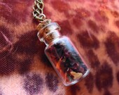 Hibiscus filled pendant