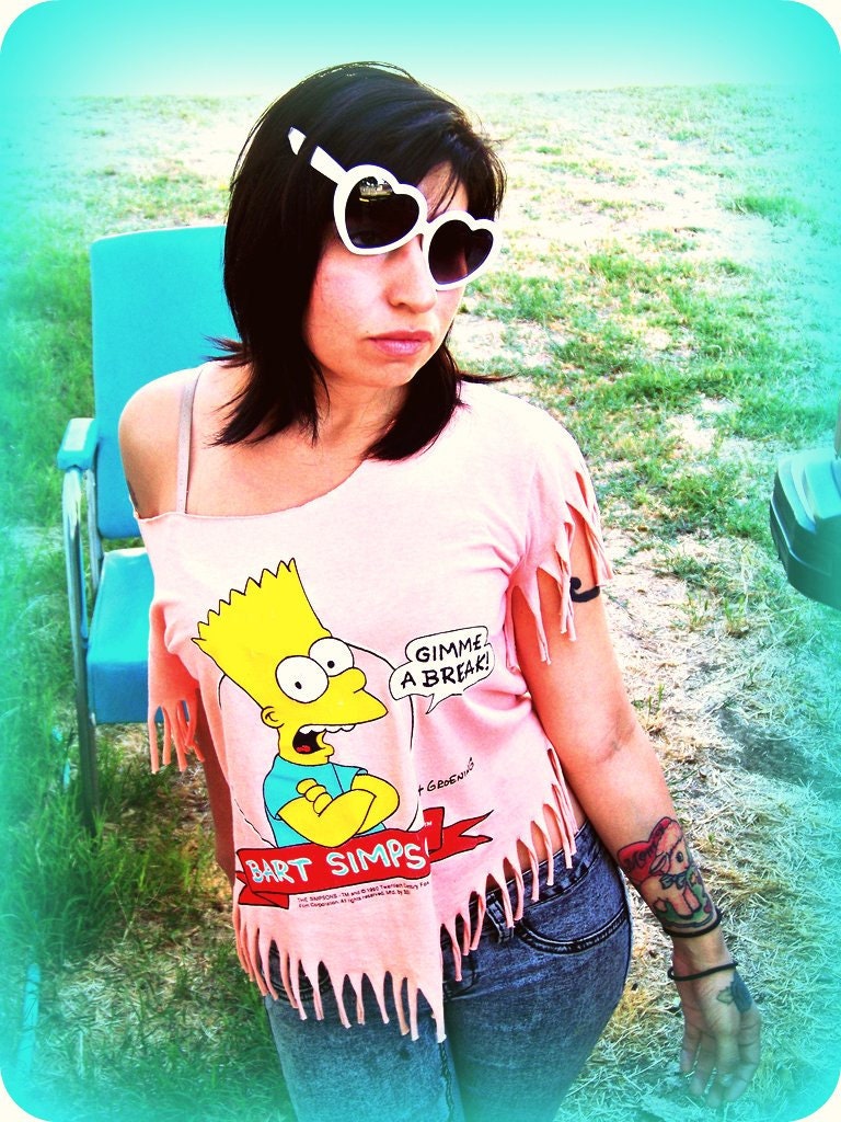 size S-M Don't have a cow man I'm just selling this Super coolio bart simpson fringe crop top