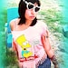size S-M Don't have a cow man I'm just selling this Super coolio bart simpson fringe crop top