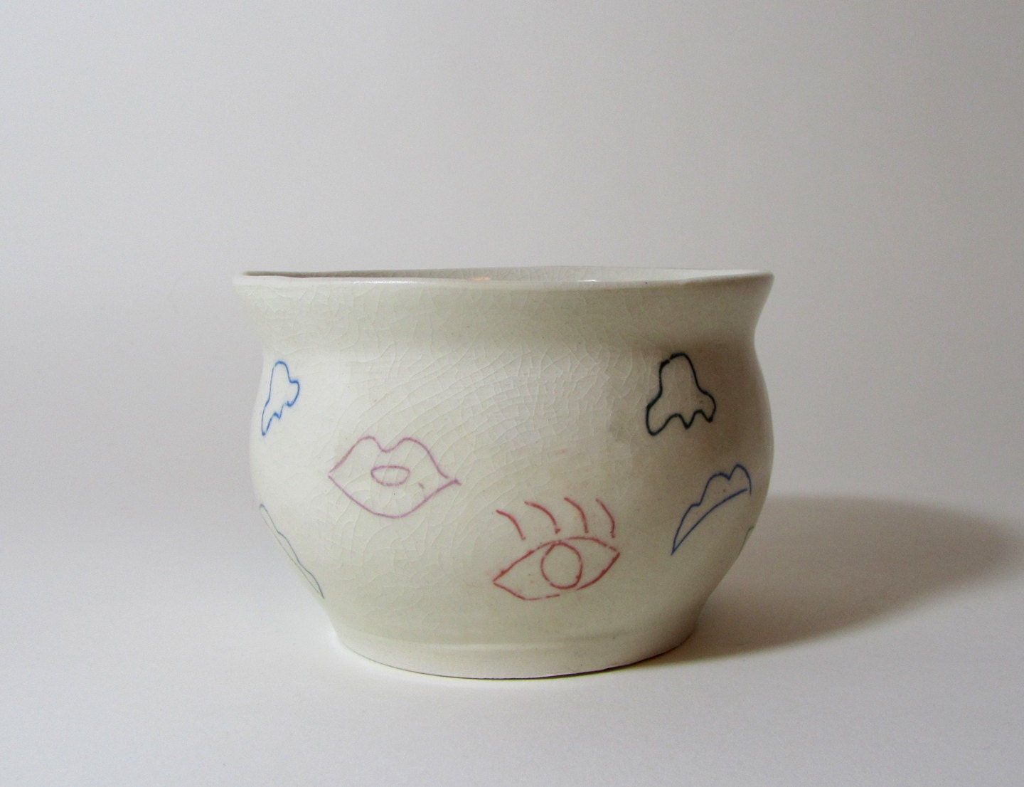 Mixed-Up Face bowl: Lips, eyes, nose, eyebrows all over the place....