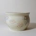 Mixed-Up Face bowl: Lips, eyes, nose, eyebrows all over the place....