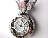 Pocket Watch Necklace - Hunger Games - Bird Charm and Pink Flower on Pocket Watch - a Primrose and Mockingjay Necklace - Katniss and Prim