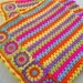 the granny stripes and squares colorful blanket