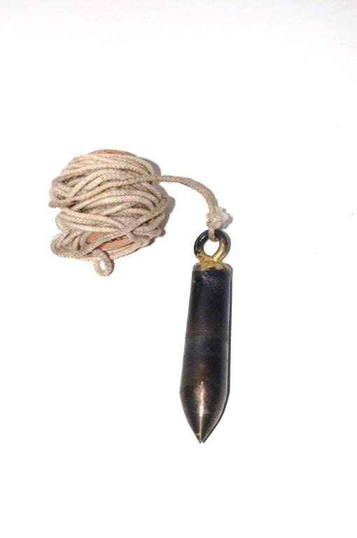 primitive plumb bob - cast iron paperweight - carpenters tool - cast iron
