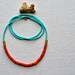 seaside reprise necklace with red coral and turquoise seed beads