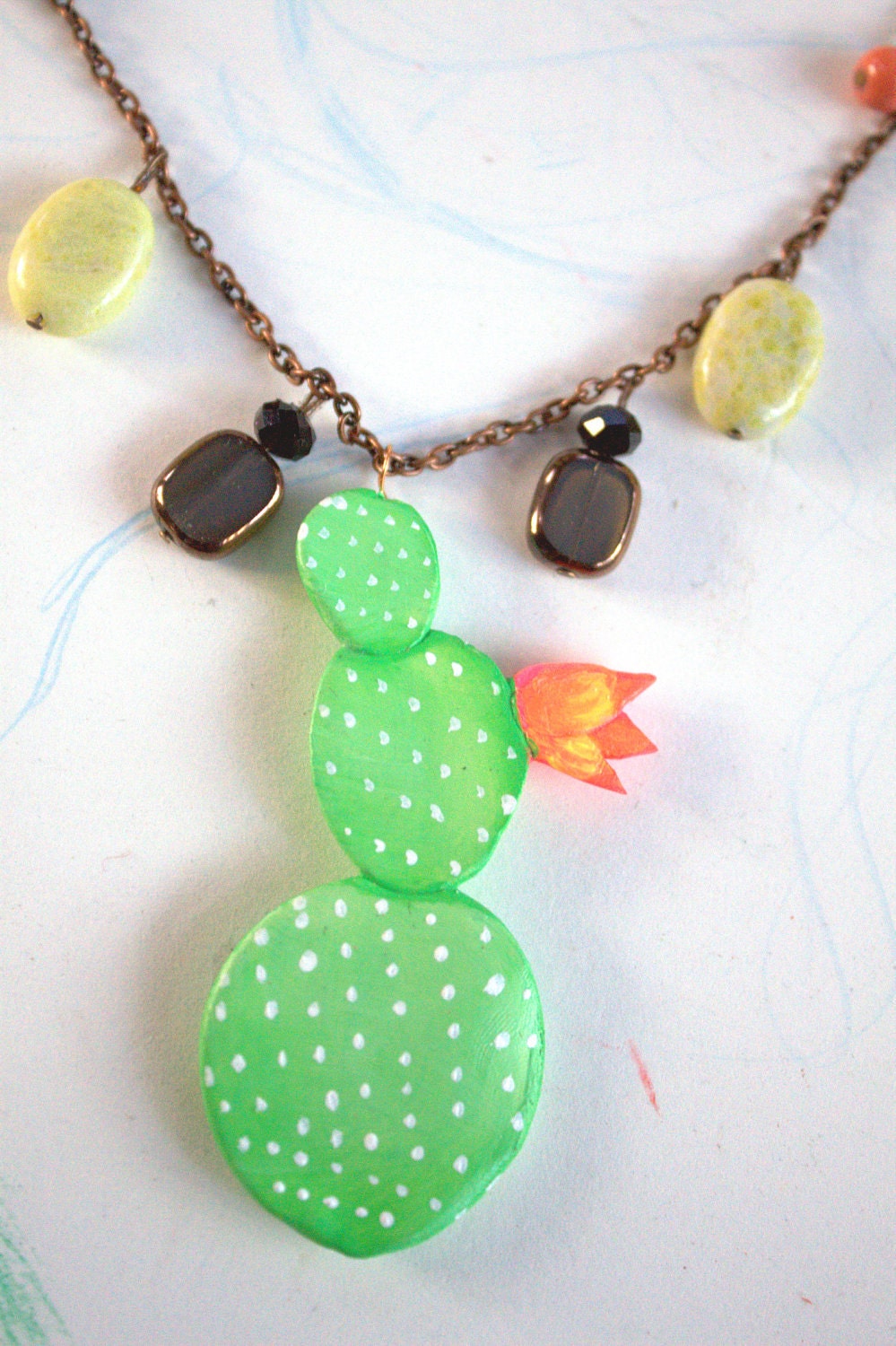 cactus with flower ornament necklace strung with glass and stone beads