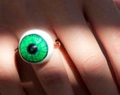 emerald green eye  with black swavroski crystal pupil wire wrapped ring