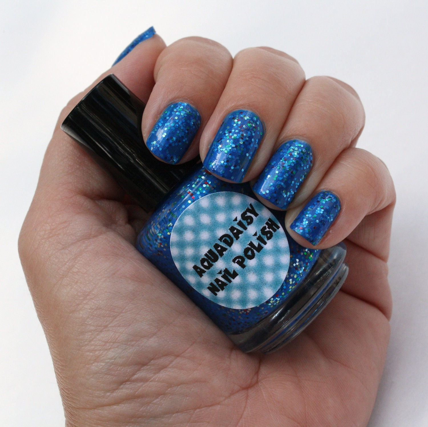 Blue glitter nail polish Music Express