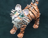 Tiger sculpture handmade in USA from a lump of clay no molds are ever used.