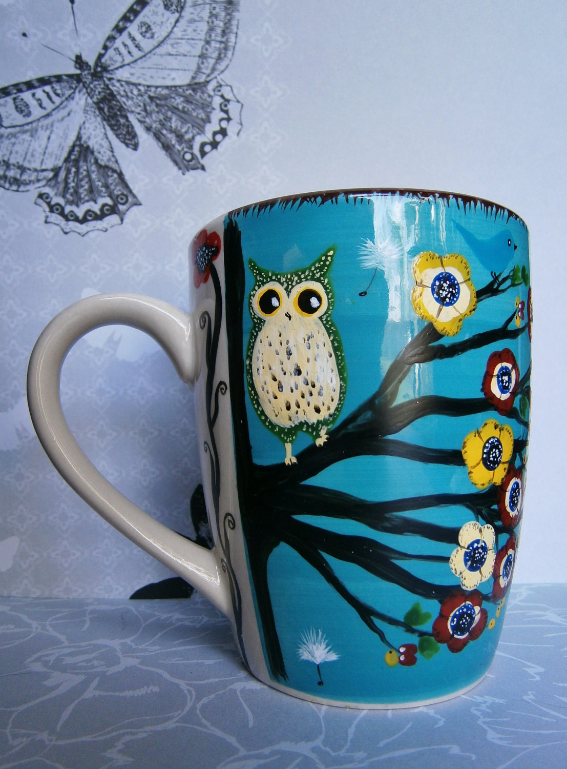 Spring Blue - Painted owl, flowers and songbirds coffee mug